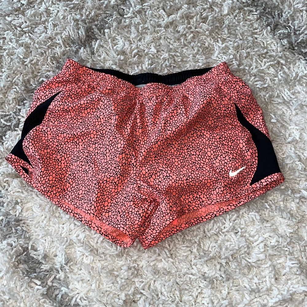 Nike pink and black exercise shorts